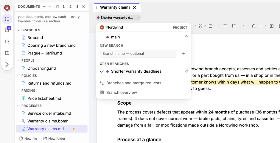 The draft menu open in the draft Shorter warranty deadlines: the project, main, the New branch field and the list of open drafts.